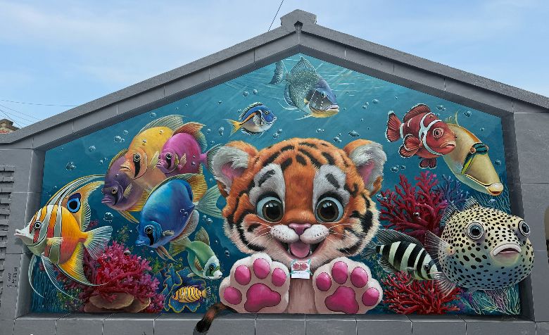 圖：曾進成老師與羅國彰同學共同完成的畫作。(新作坊)